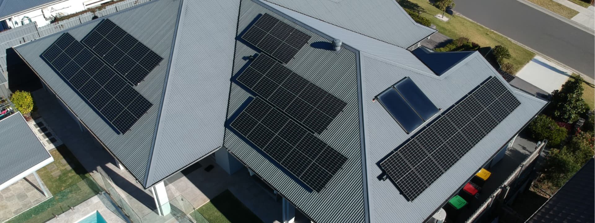 Aerial view of residential solar panels on a grey roof